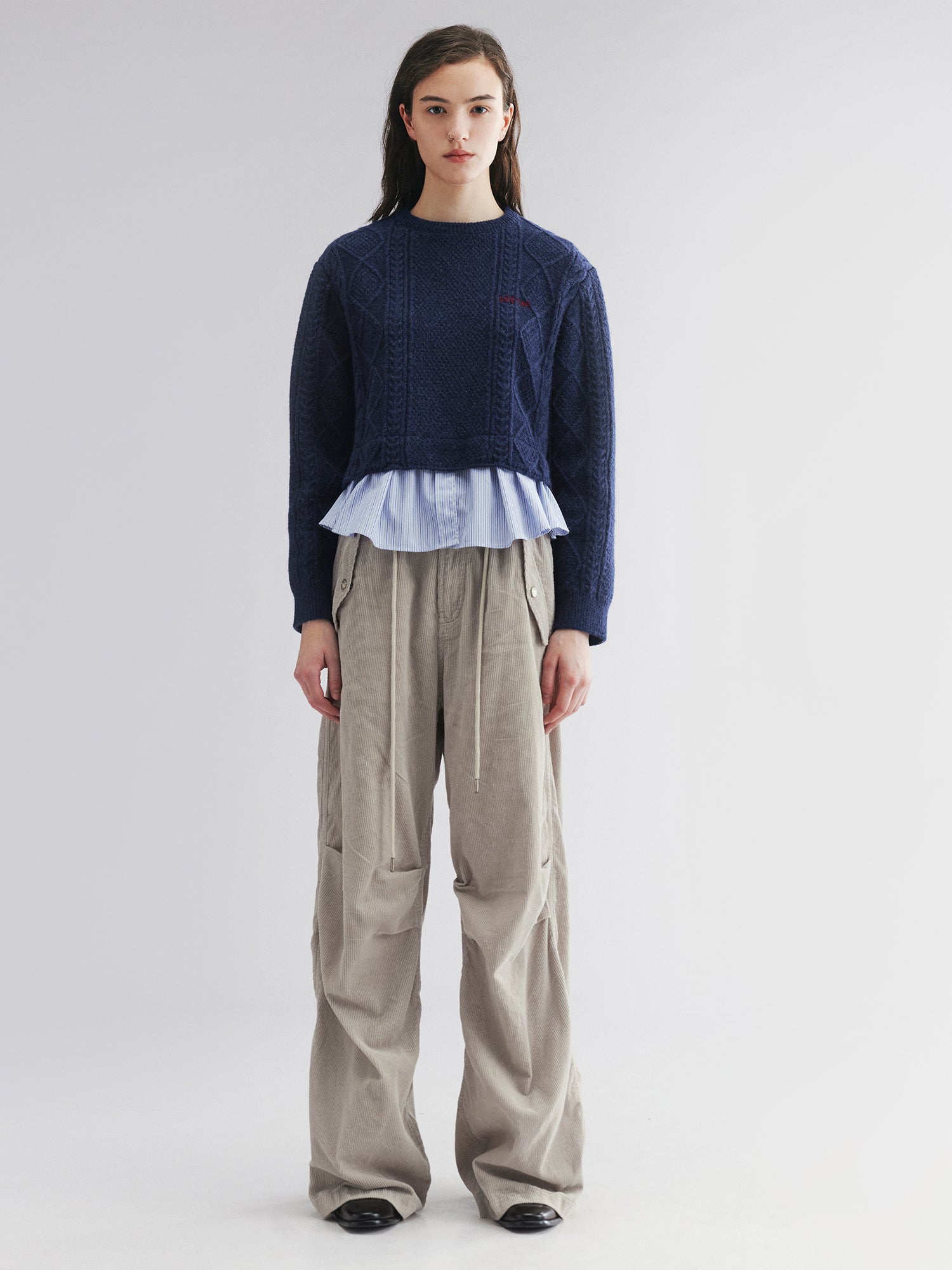 Pullover knit with layered shirt design