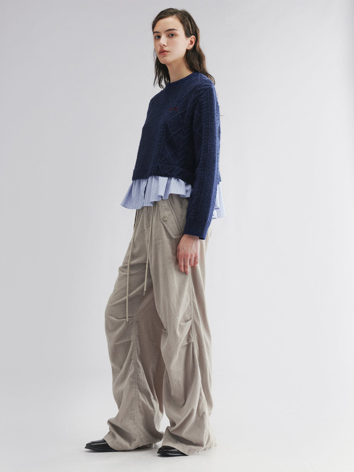 Pullover knit with layered shirt design