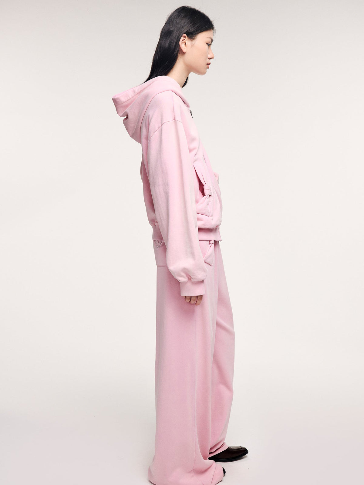 Washed sweatpants with bow detail at the waist