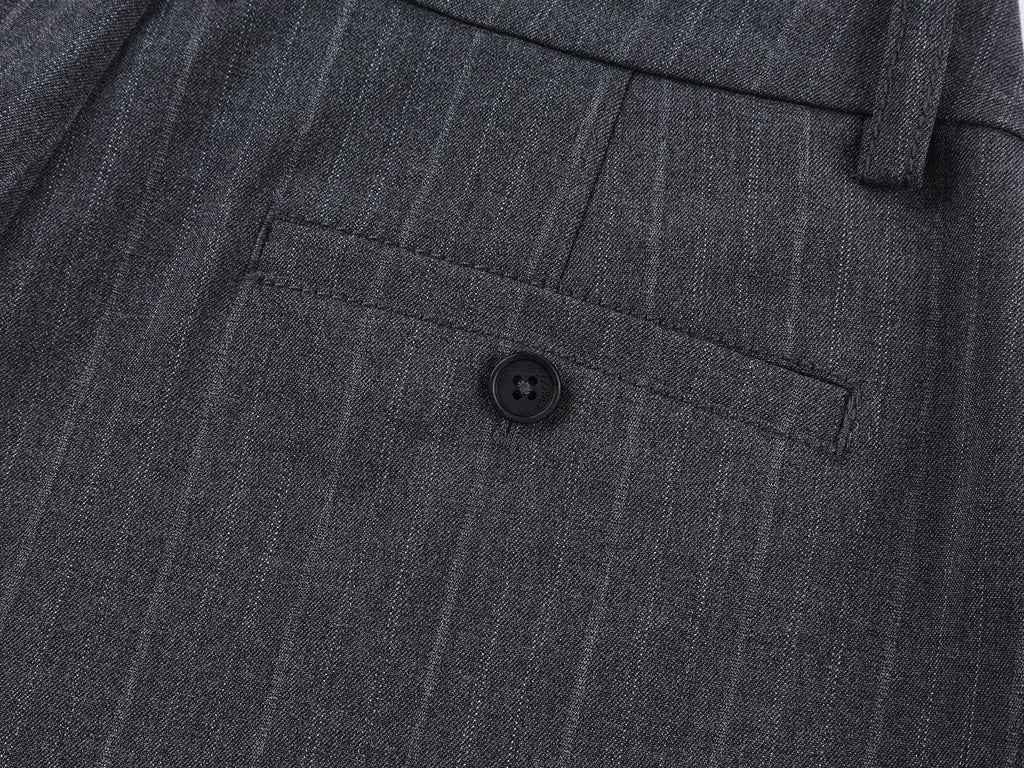 Draped tailored trousers with curved pleats