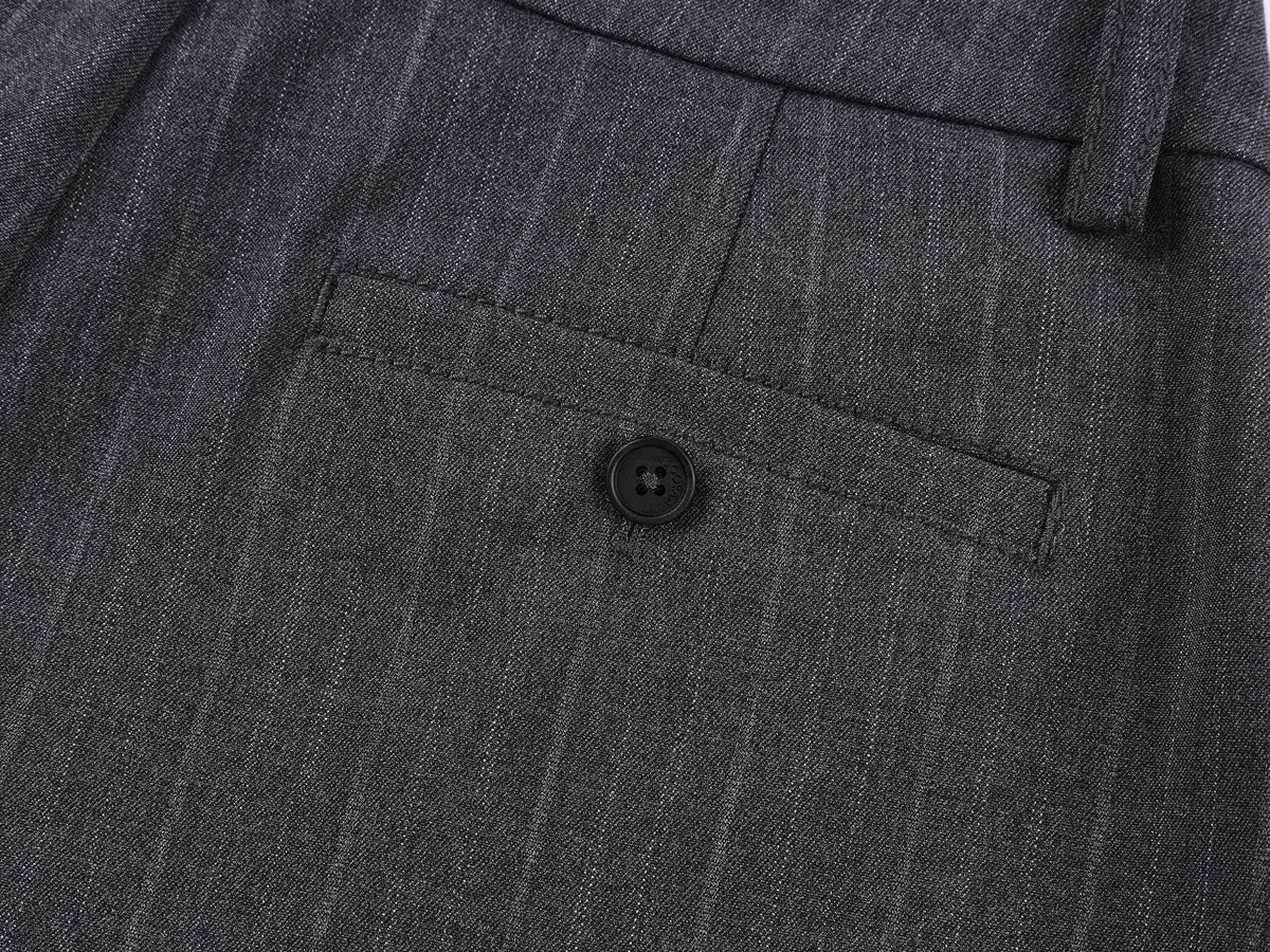 Draped tailored trousers with curved pleats