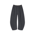 Draped tailored trousers with curved pleats