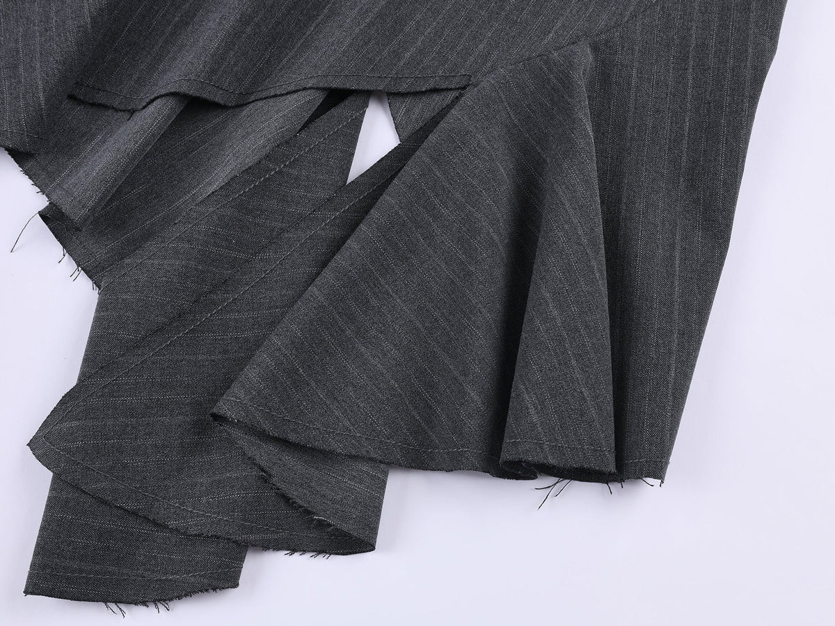 Tailored skirt with asymmetric ruffle trim