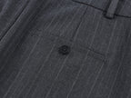 Tailored skirt with asymmetric ruffle trim