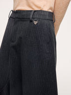 Tailored skirt with asymmetric ruffle trim