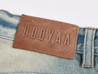Pocket-flap washed denim jeans