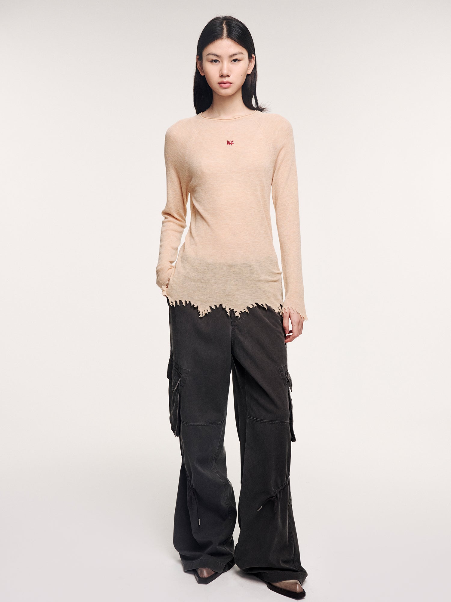 100% wool pullover with asymmetric hemline
