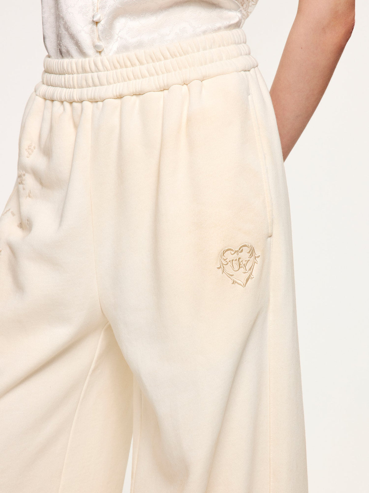Distressed embroidered sweatpants