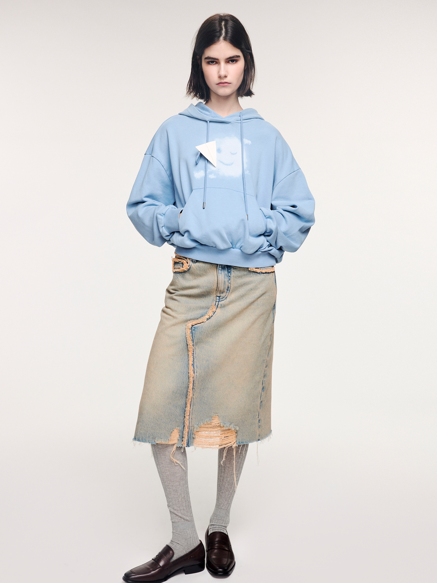 Washed raw-edge denim skirt