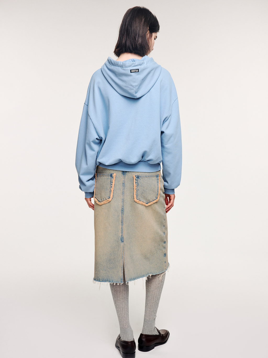Washed raw-edge denim skirt