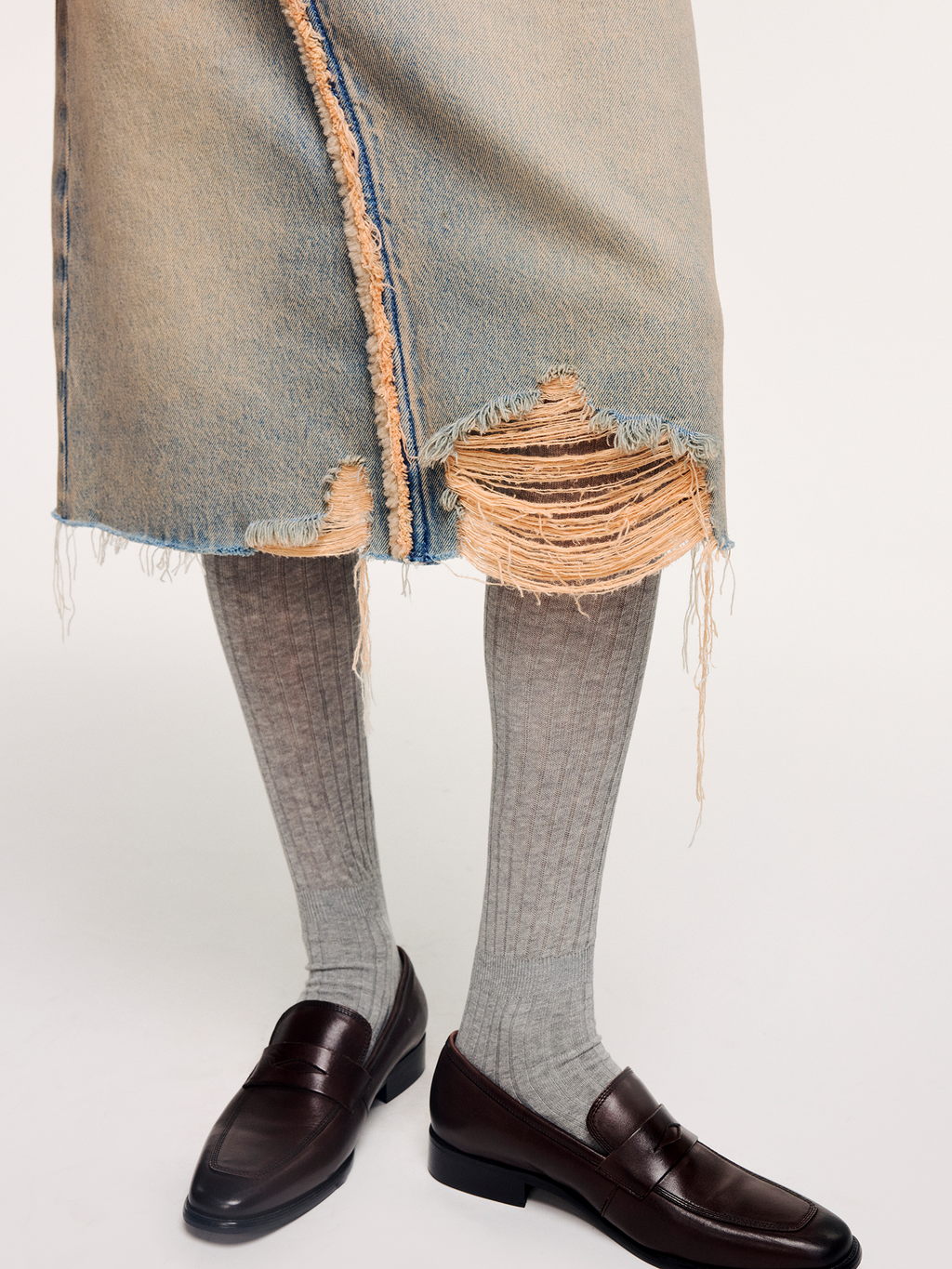Washed raw-edge denim skirt
