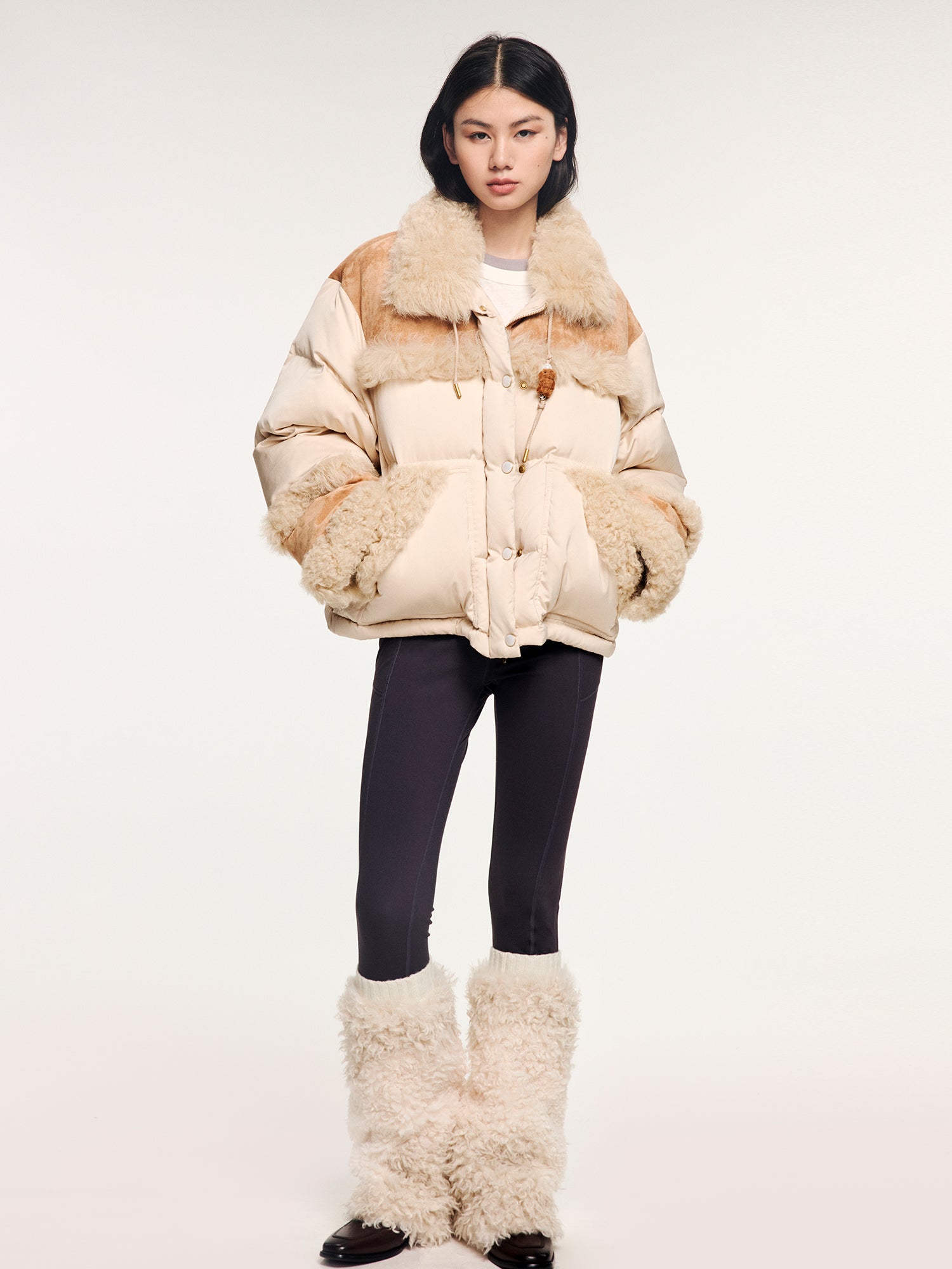 Yoga pants with faux fur sock-like cuffs