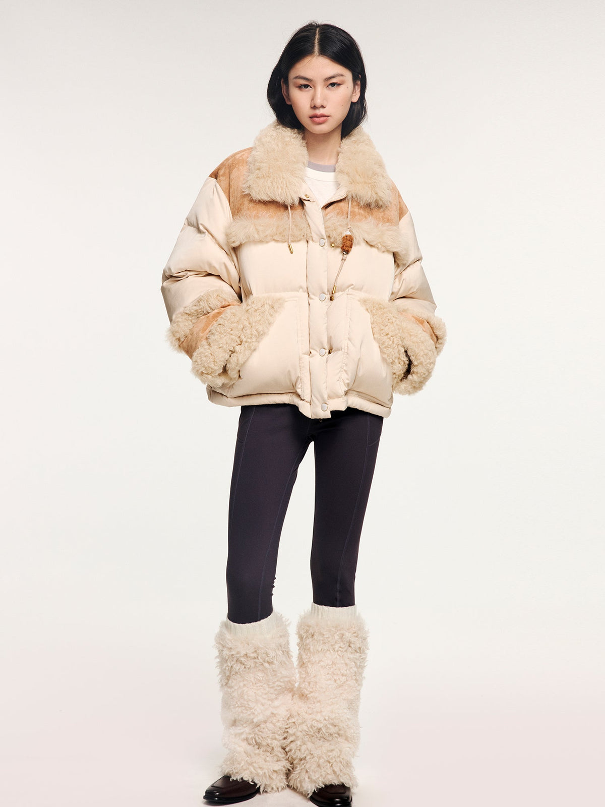 Yoga pants with faux fur sock-like cuffs