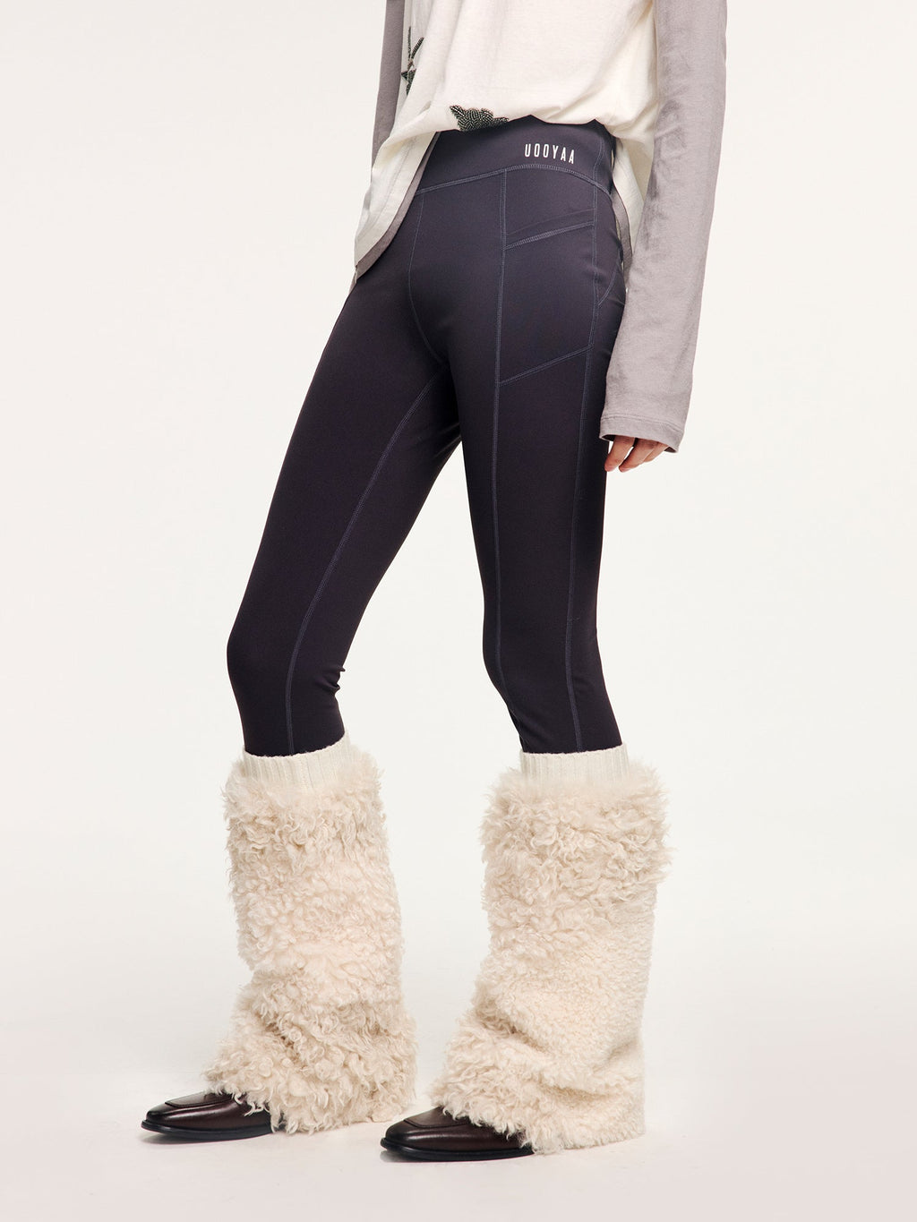 Yoga pants with faux fur sock-like cuffs