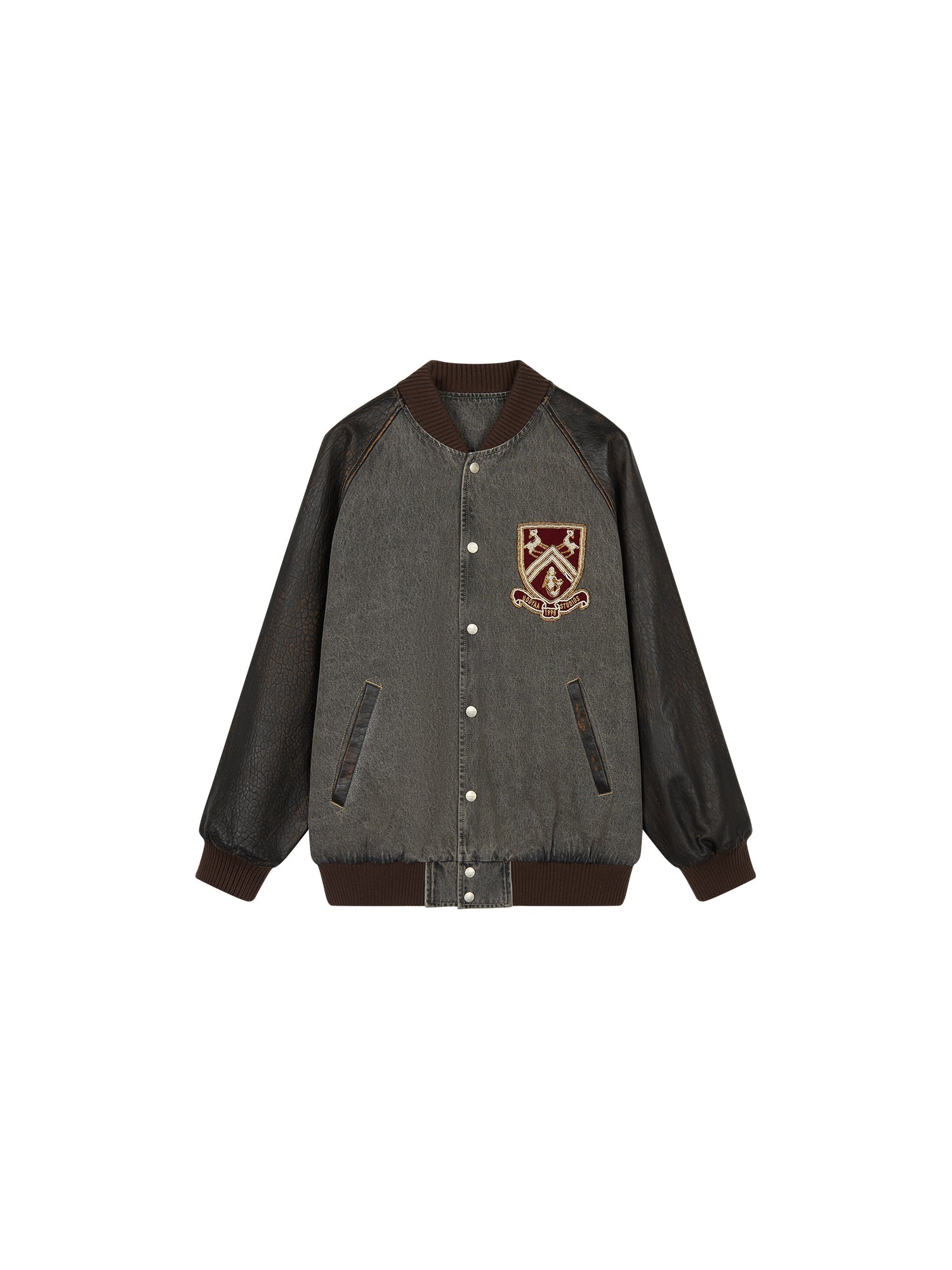 Baseball jacket with leather sleeves and badges