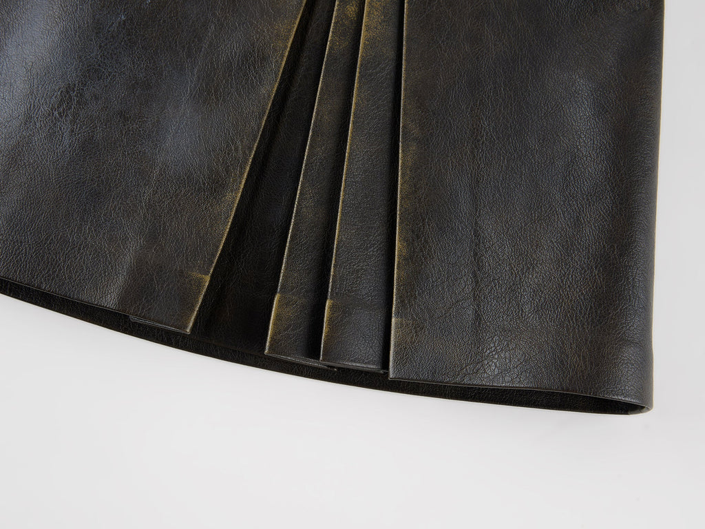 Vintage rubbed pleated leather mini skirt