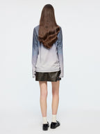 Vintage rubbed pleated leather mini skirt