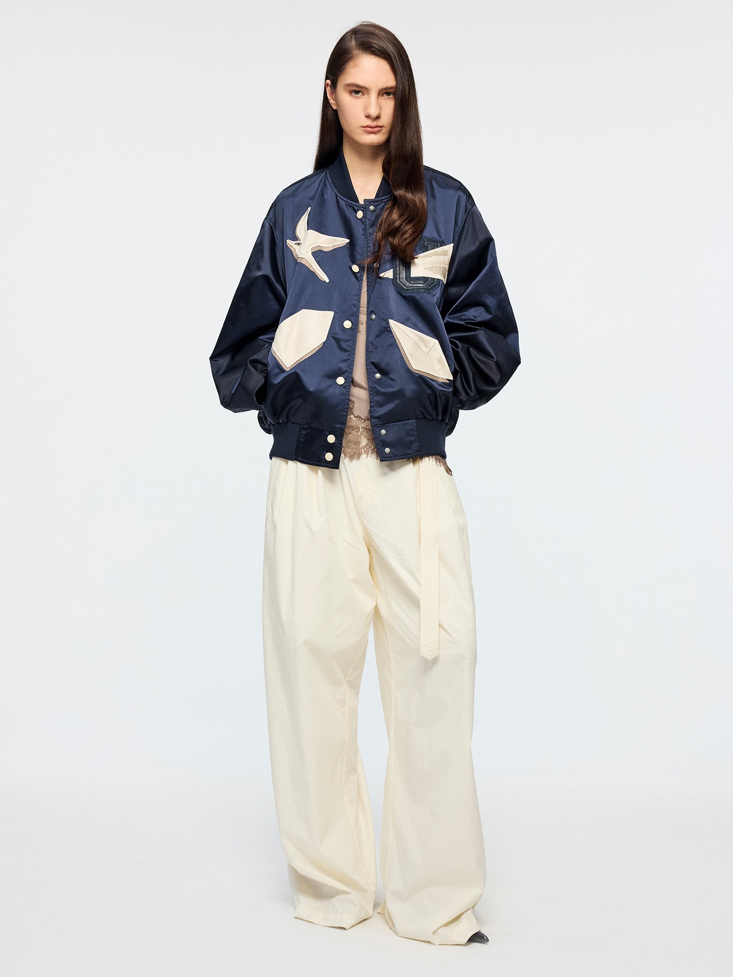 Origami bird PU leather applique baseball jacket