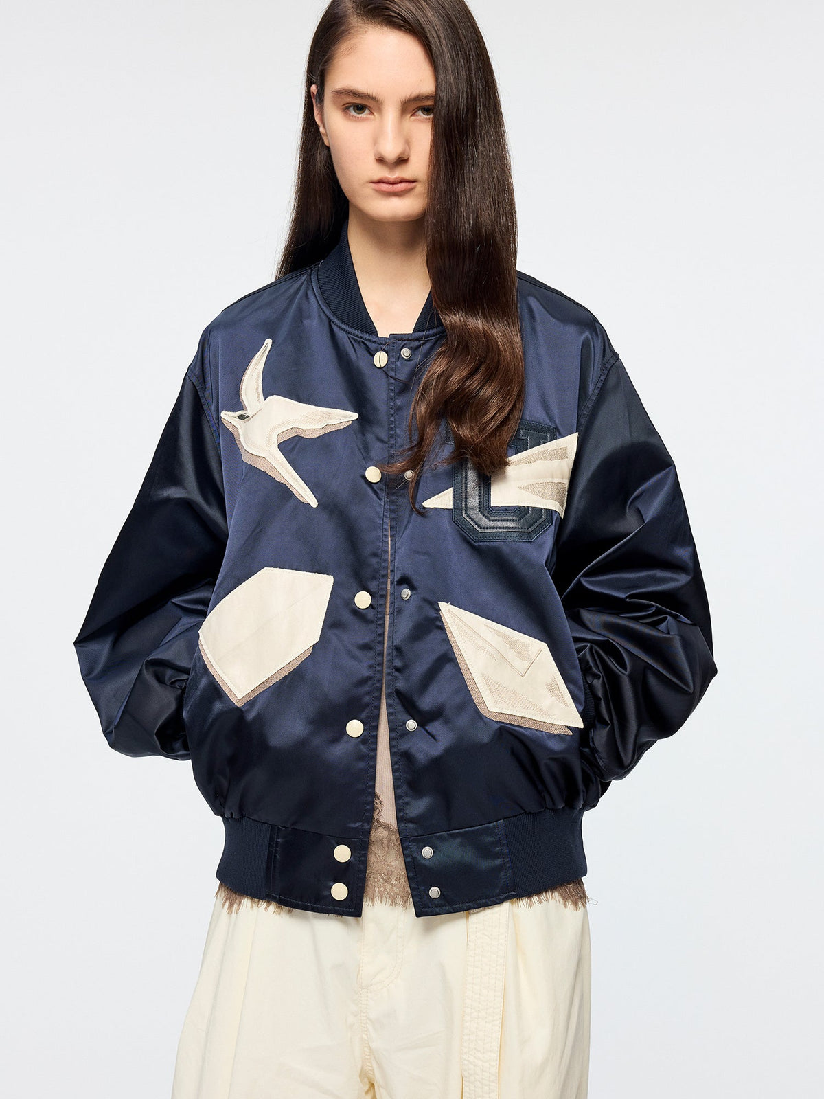Origami bird PU leather applique baseball jacket