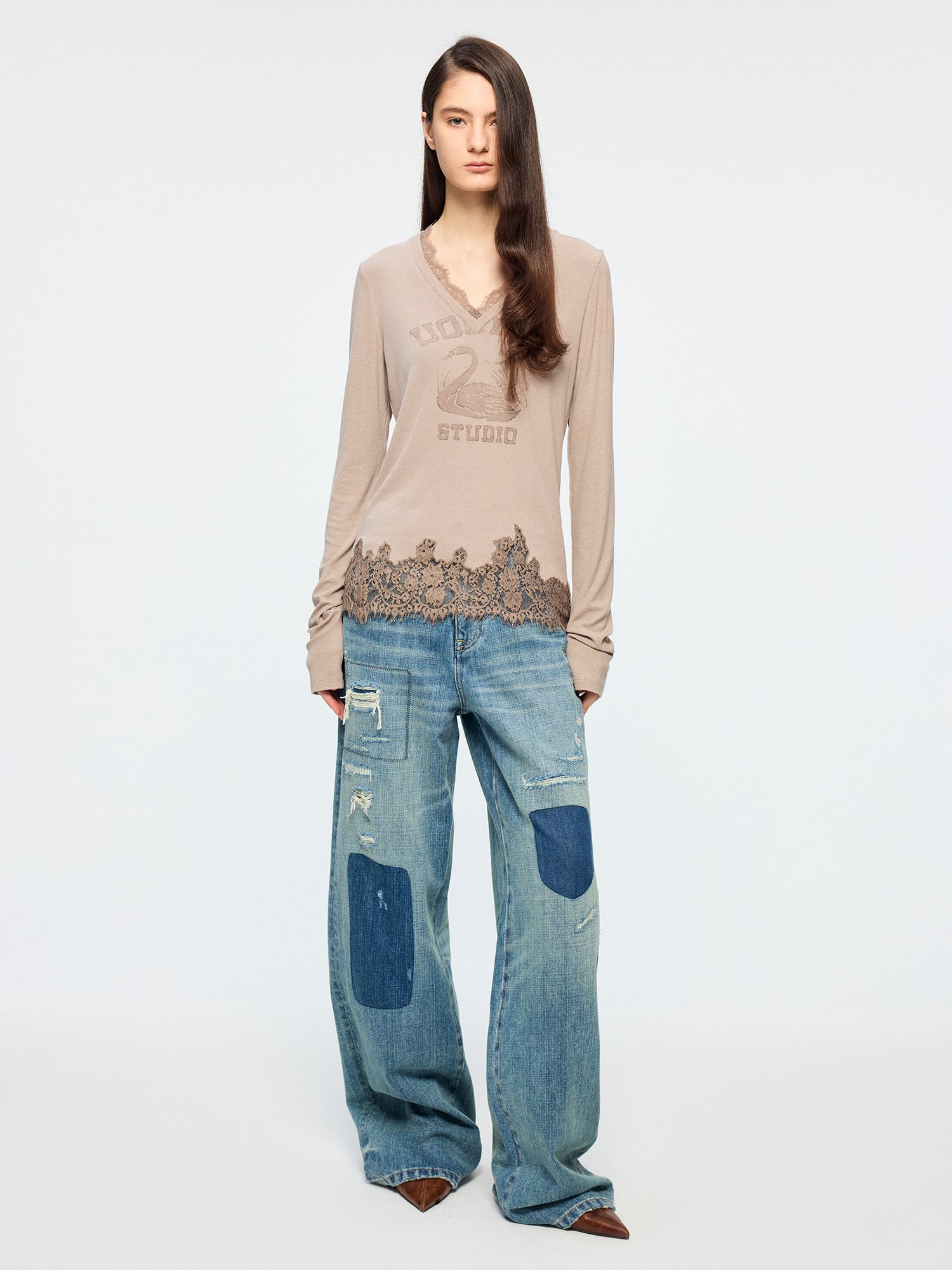 Distressed patchwork jeans