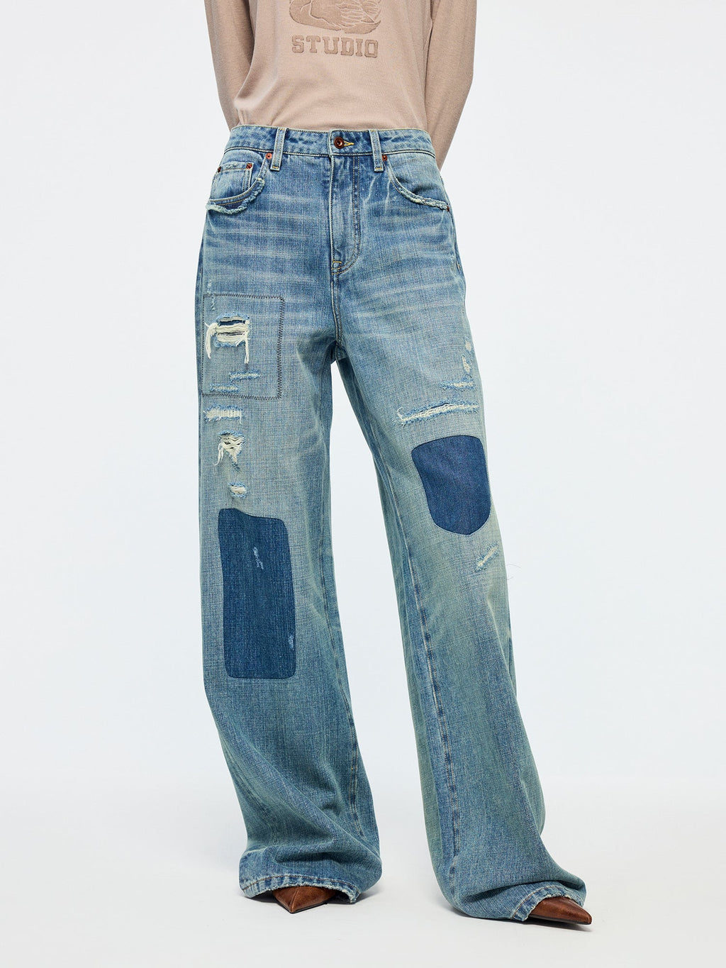 Distressed patchwork jeans