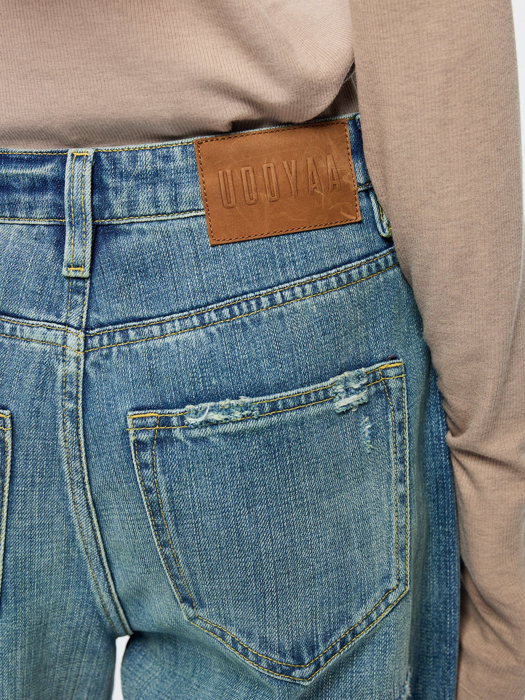Distressed patchwork jeans
