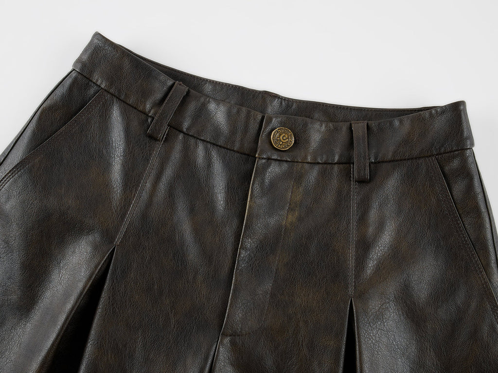 Vintage rubbed pleated leather pants