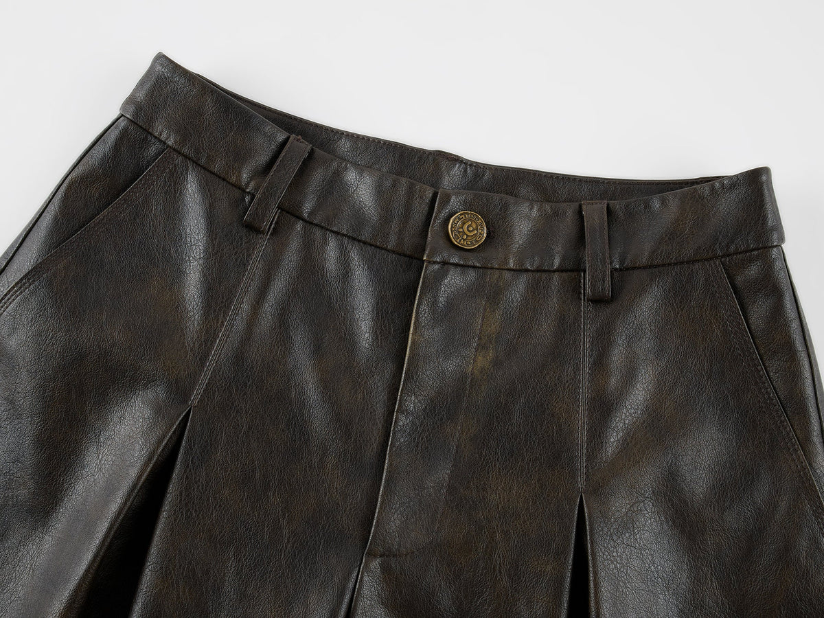Vintage rubbed pleated leather pants