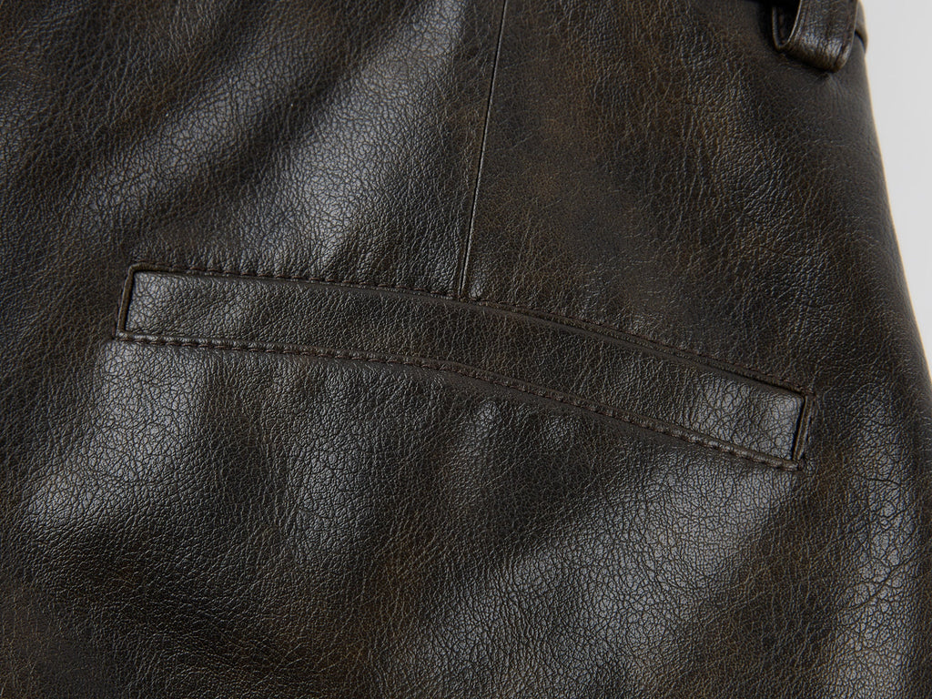Vintage rubbed pleated leather pants