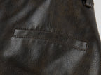 Vintage rubbed pleated leather pants