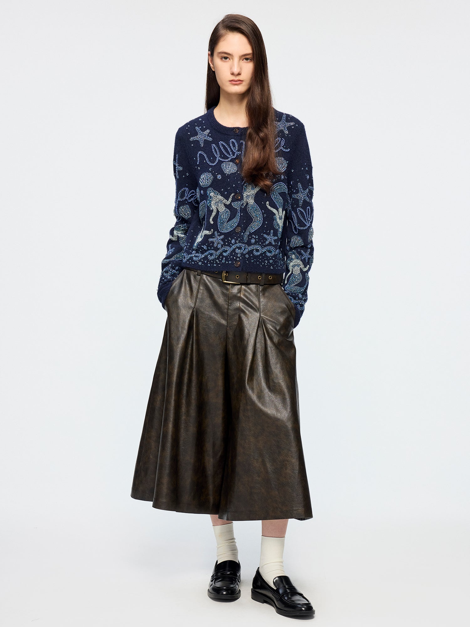 Vintage rubbed pleated leather pants