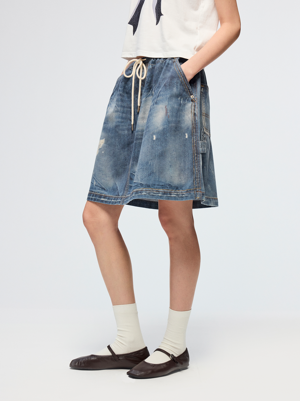Surreal optical illusion denim mini skirt