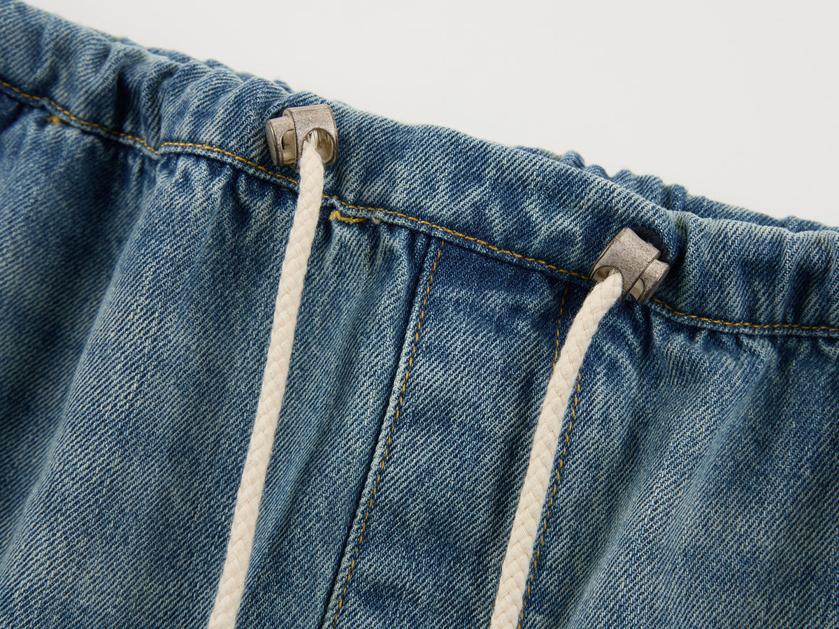 Distressed denim cargo skirt