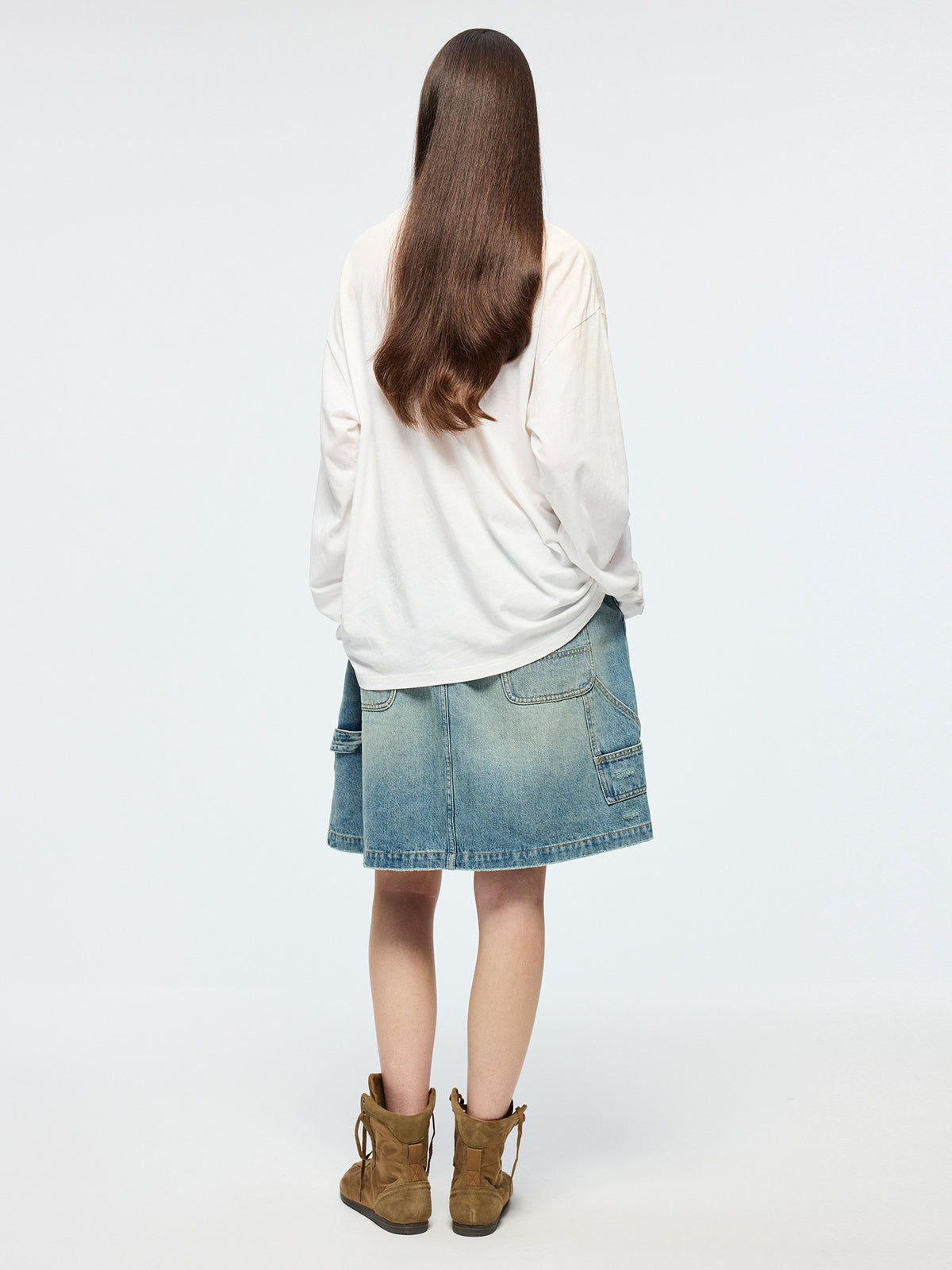 Distressed denim cargo skirt