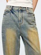 Washed dirty spray jeans