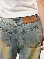 Washed dirty spray jeans