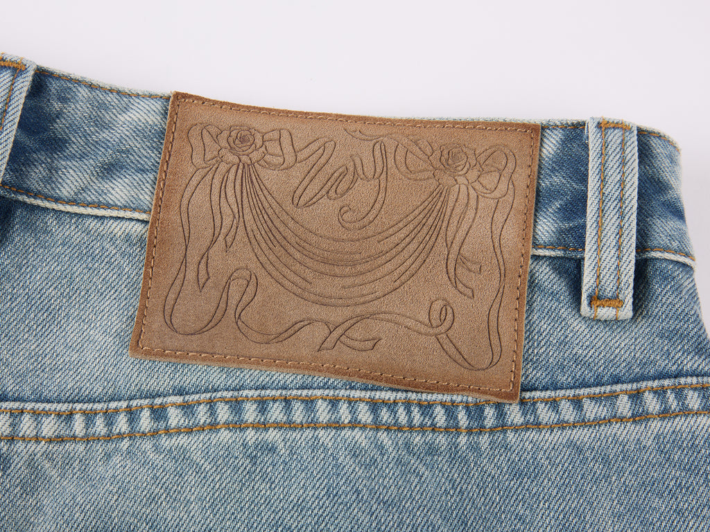 Pearl chain distressed jeans