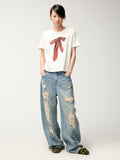 Pearl chain distressed jeans