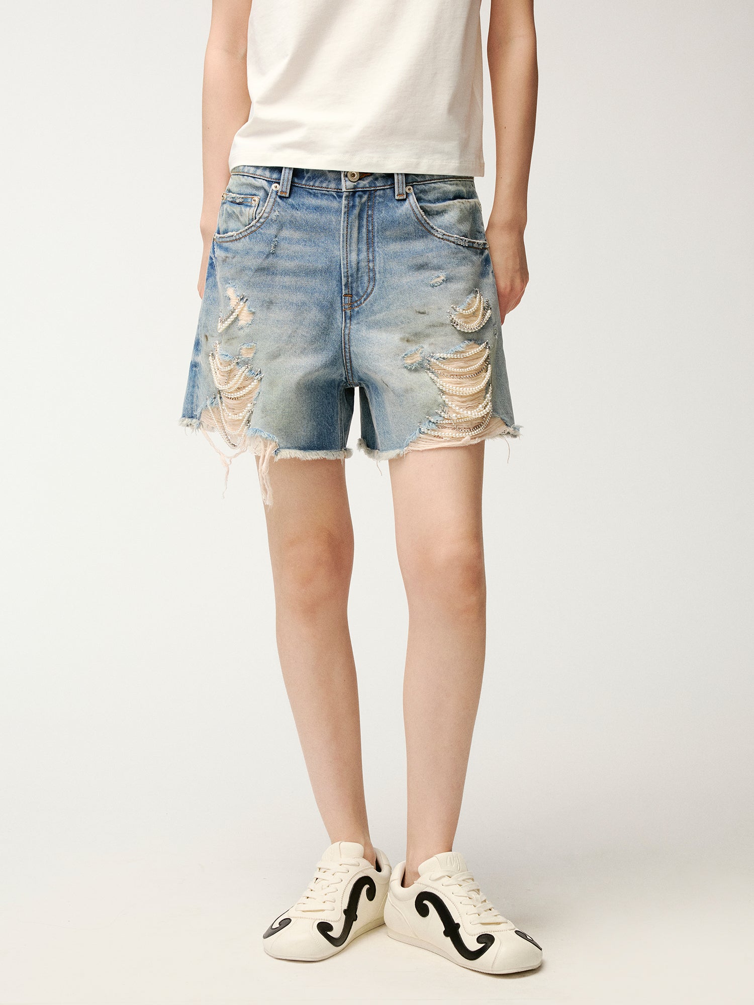 Pearl chain distressed denim shorts