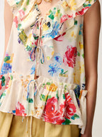 Floral ruffle and insect print vest