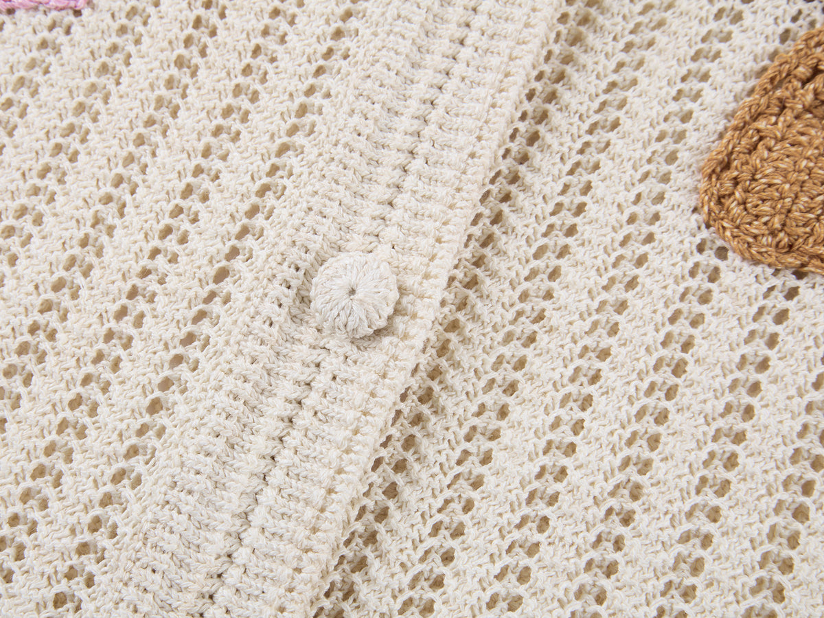 Hand-crocheted bow cardigan