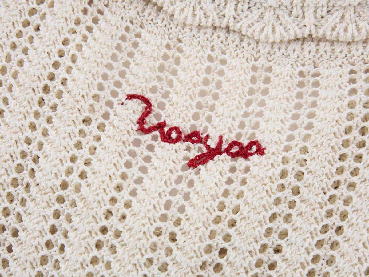 Hand-crocheted bow cardigan