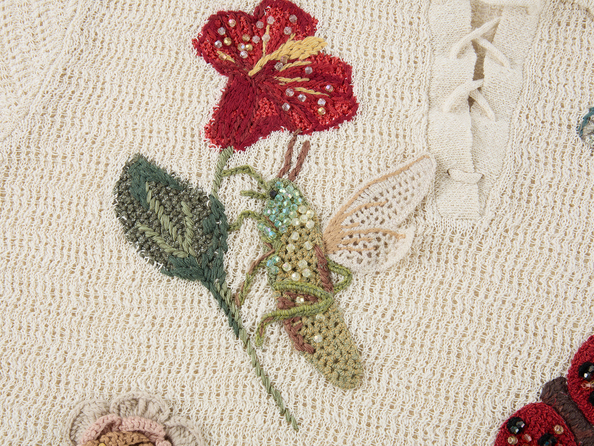 Hand-crocheted insect and floral tie-front polo knit shirt