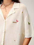 Hand-embroidered insect and floral cuban collar cardigan