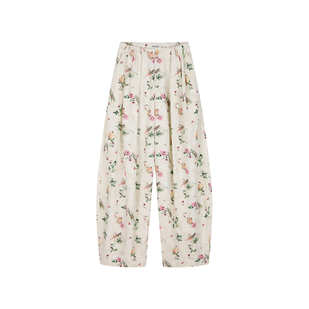 Insect and floral print curved pants