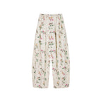 Insect and floral print curved pants