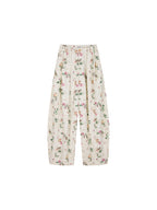 Insect and floral print curved pants