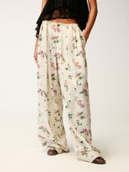 Insect and floral print curved pants
