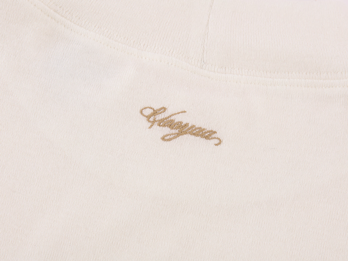 Petty Teddy Embroidered Mock Neck Top