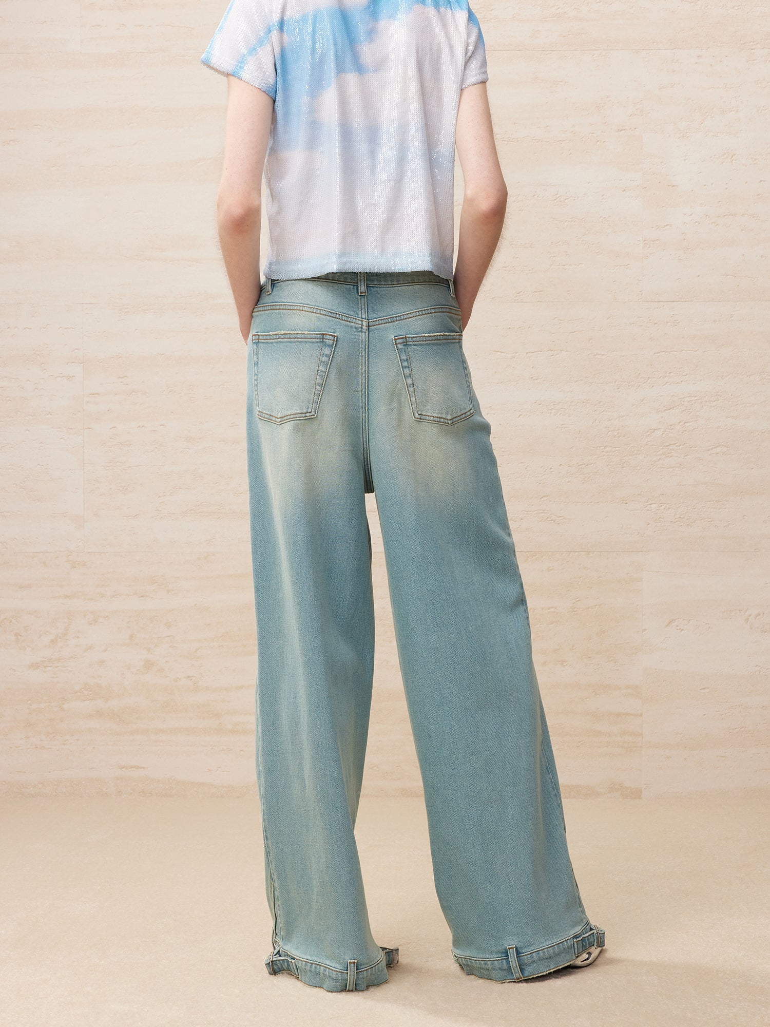 Deconstructed washed wide leg jeans